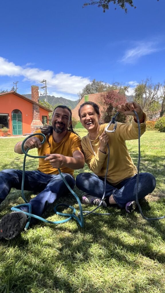 Founders of Colombian Andes Journeys preparing climbing gear during a rock climbing experience in Colombia