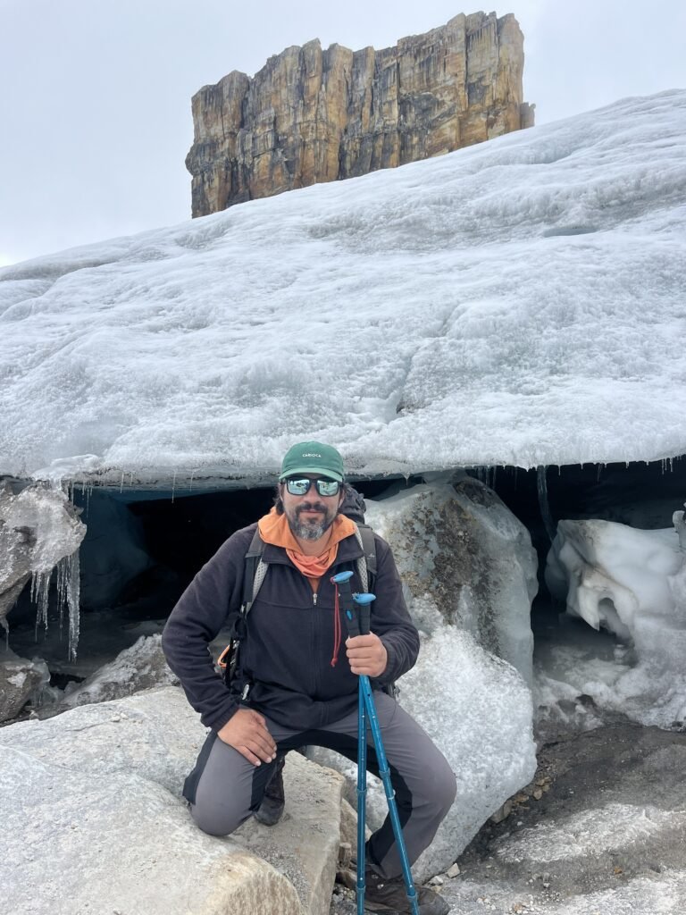 Professional mountain guide on El Cocuy glacier in the Colombian Andes during a high-altitude expedition