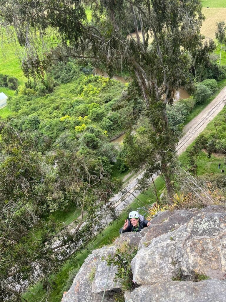Guided rock climbing in suesca surounded by nature and a trail