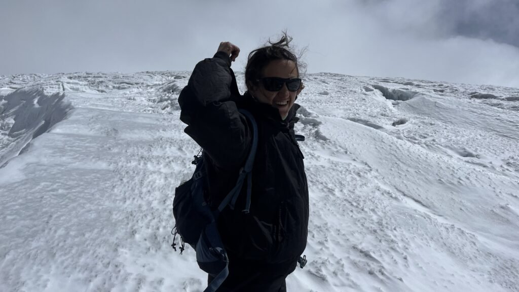 Traveler exploring El Cocuy glacier during a guided high-altitude expedition in Colombia